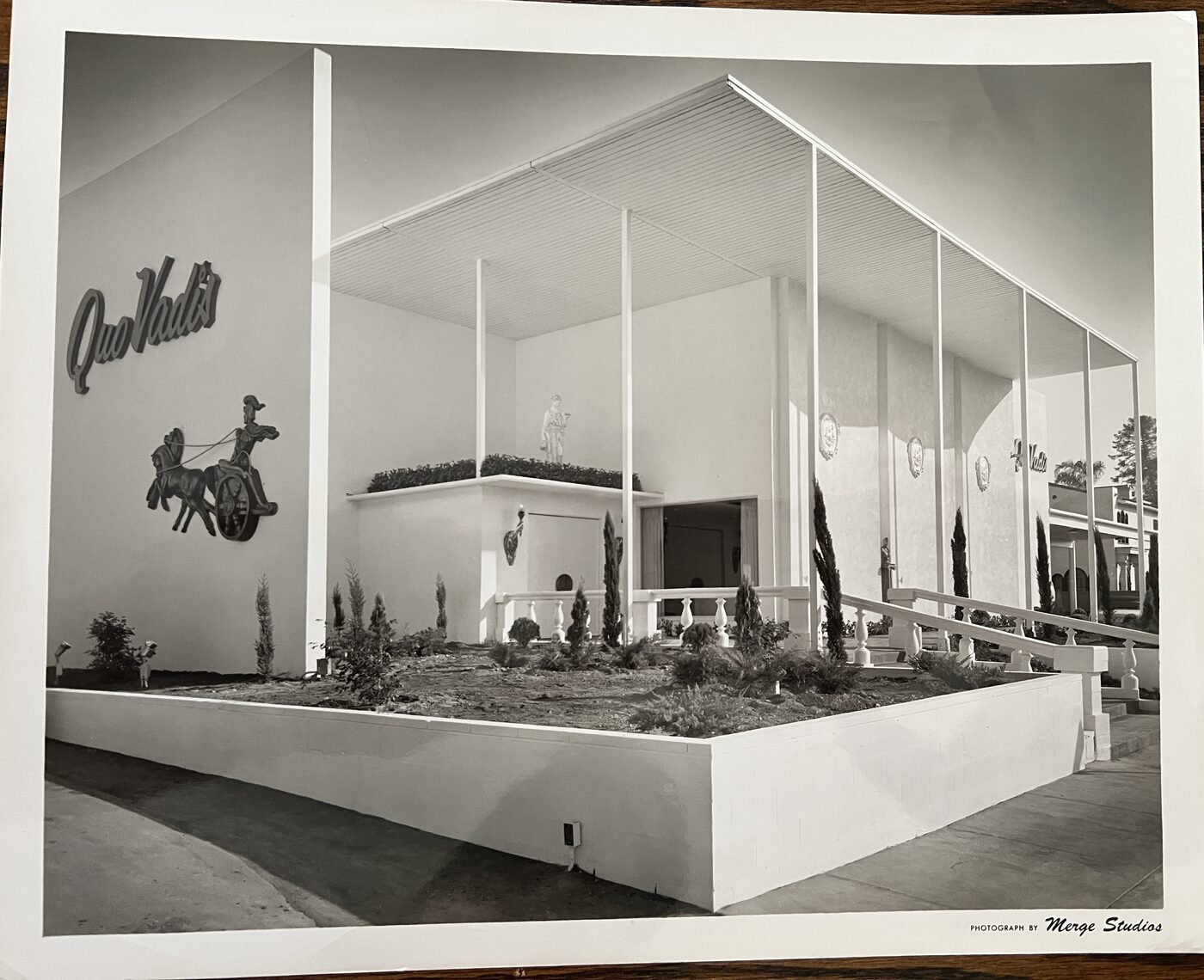 Historic Quo Vadis restaurant exterior in Hollywood with Roman charioteer relief